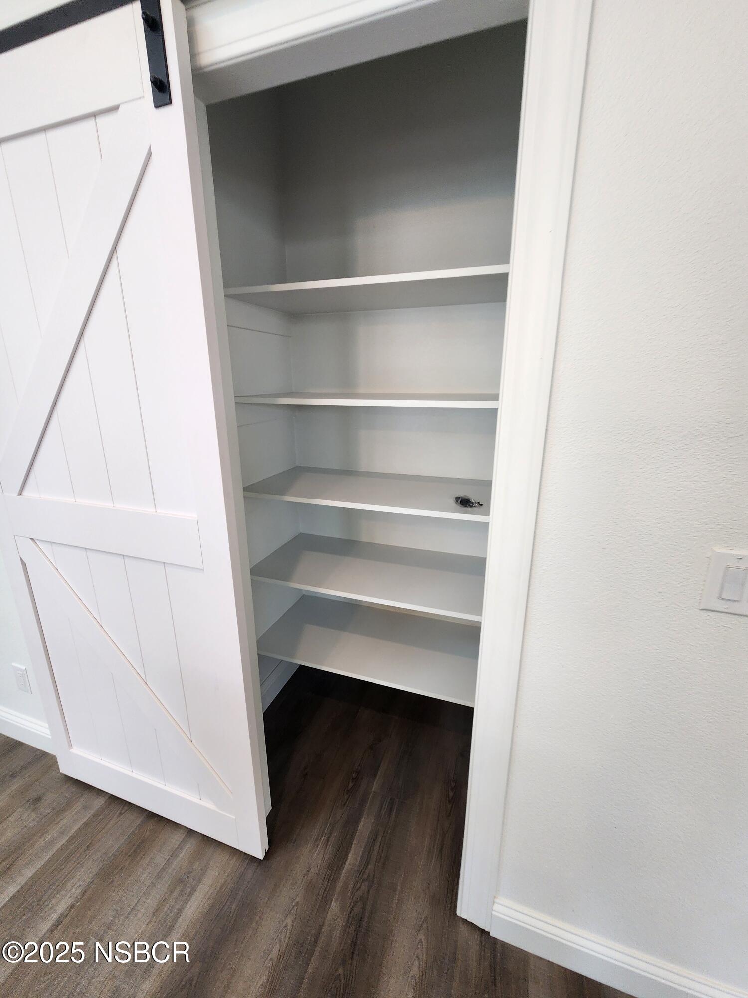87 Rio Vista Solvang, CA 93463 - Photo 4 of 18 a view of walk in closet with empty racks