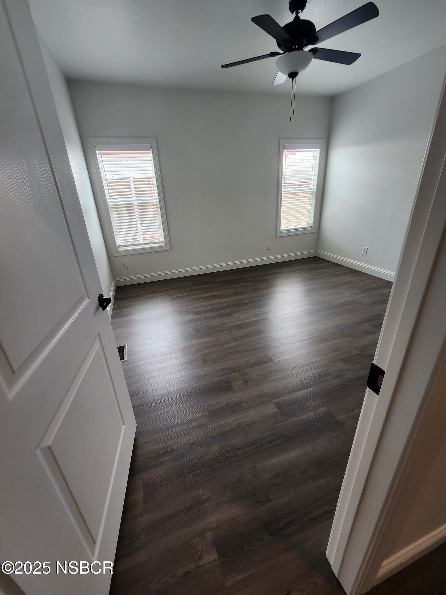 87 Rio Vista Solvang, CA 93463 - Photo 9 of 18 wooden floor in an empty room with a window