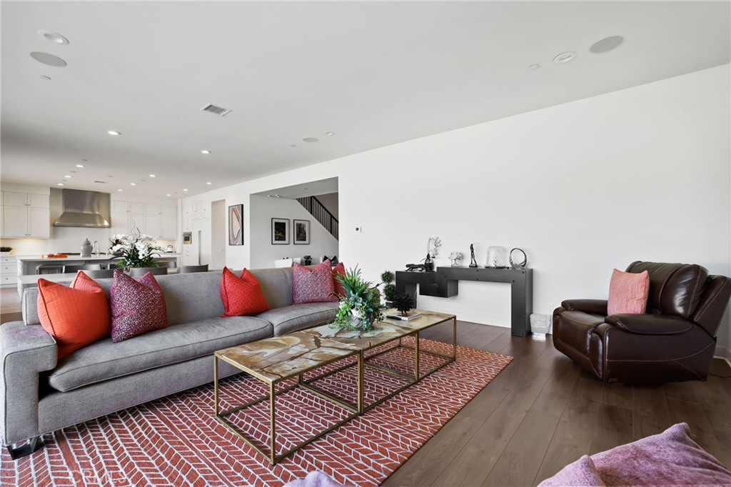74 Egret Irvine, CA 92618 - Photo 11 of 74 a living room with furniture and wooden floor