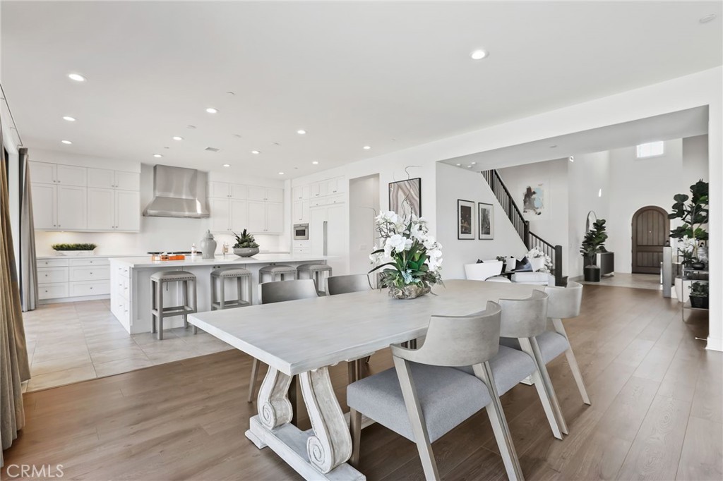 74 Egret Irvine, CA 92618 - Photo 13 of 74 a view of a dining room with furniture and wooden floor