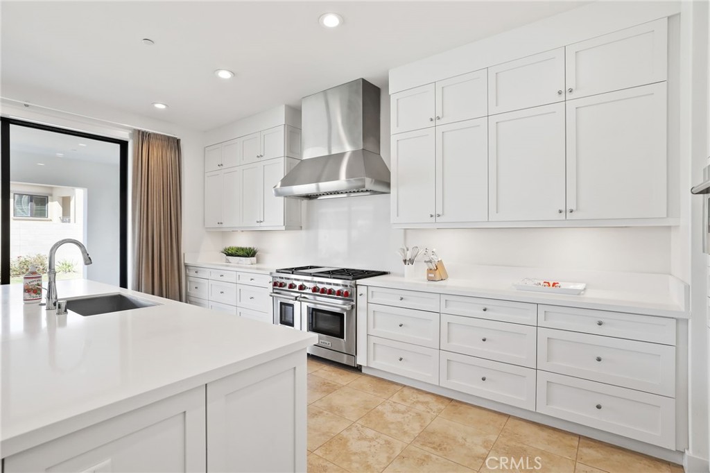 74 Egret Irvine, CA 92618 - Photo 18 of 74 a kitchen with white cabinets and sink