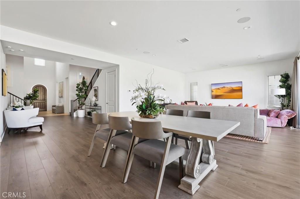 74 Egret Irvine, CA 92618 - Photo 21 of 74 a view of a dining room with furniture and wooden floor