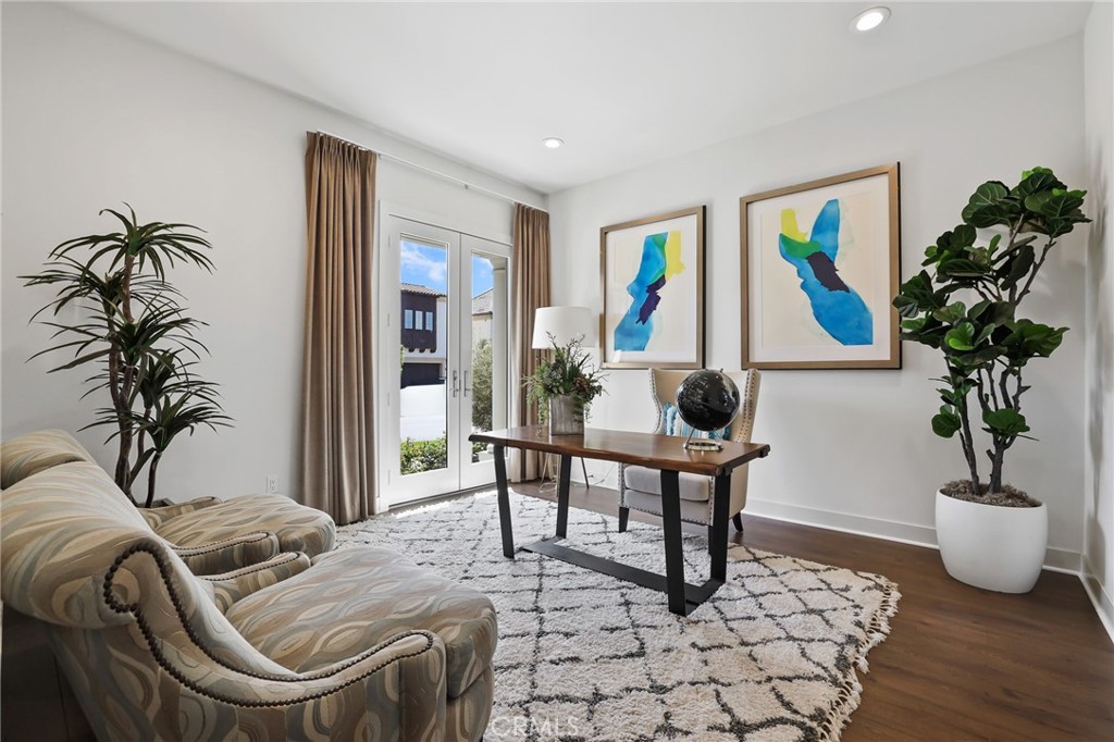 74 Egret Irvine, CA 92618 - Photo 25 of 74 a living room with furniture flowerpot and wooden floor