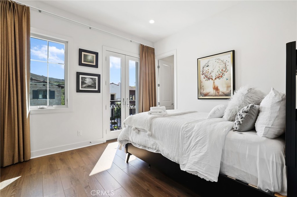 74 Egret Irvine, CA 92618 - Photo 40 of 74 a bedroom with a large bed and a window