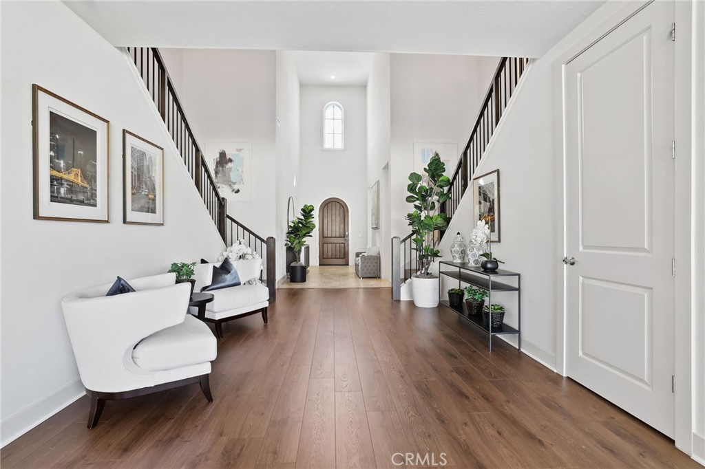 74 Egret Irvine, CA 92618 - Photo 6 of 74 a living room with furniture and a wooden floor