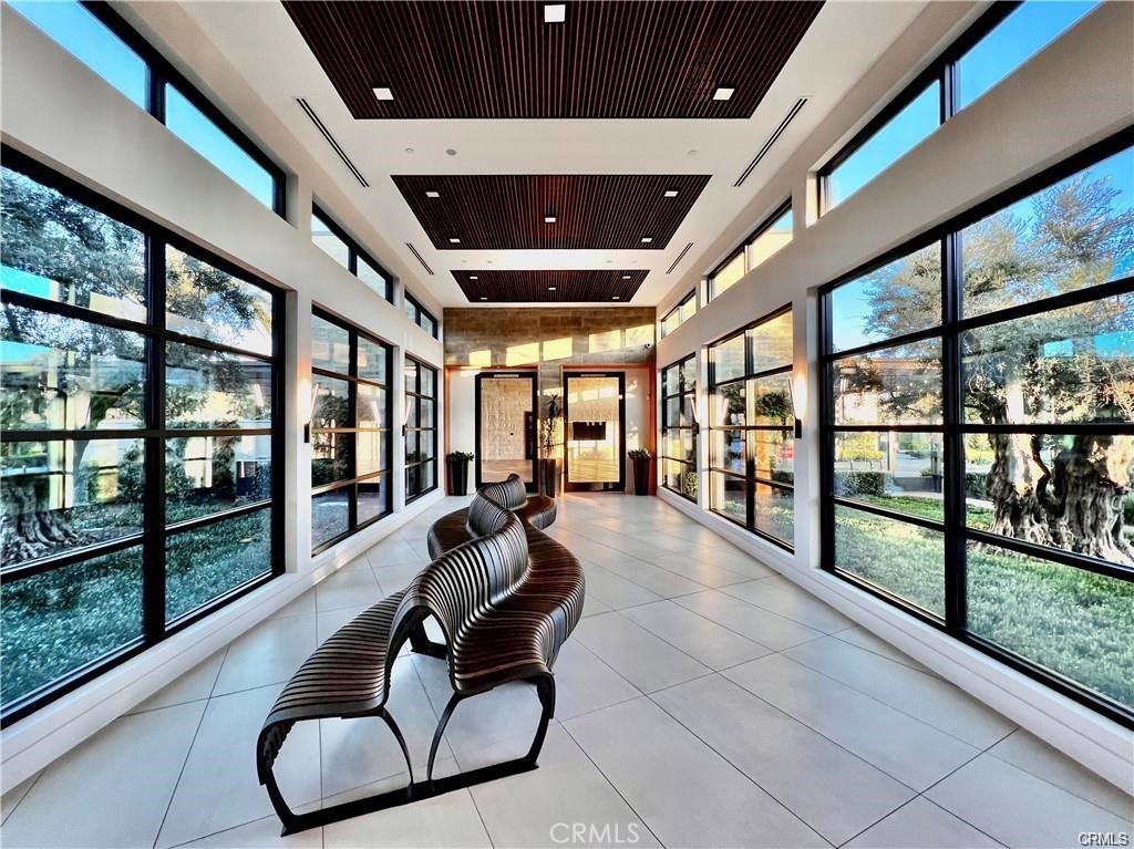 74 Egret Irvine, CA 92618 - Photo 72 of 74 a living room with furniture and a floor to ceiling window