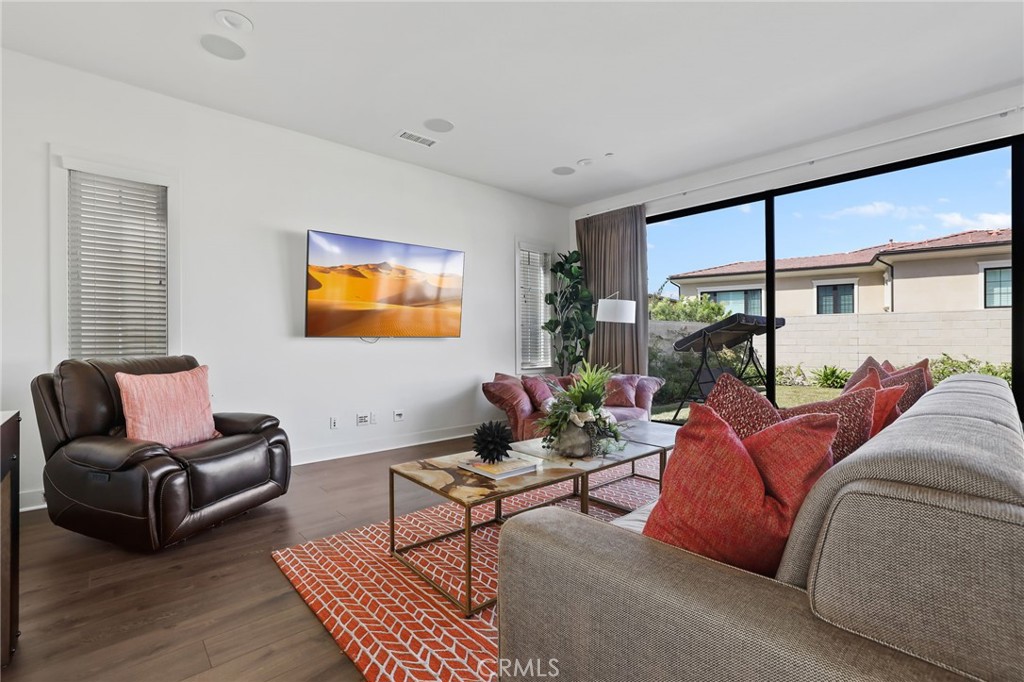 74 Egret Irvine, CA 92618 - Photo 9 of 74 a living room with furniture and a large window