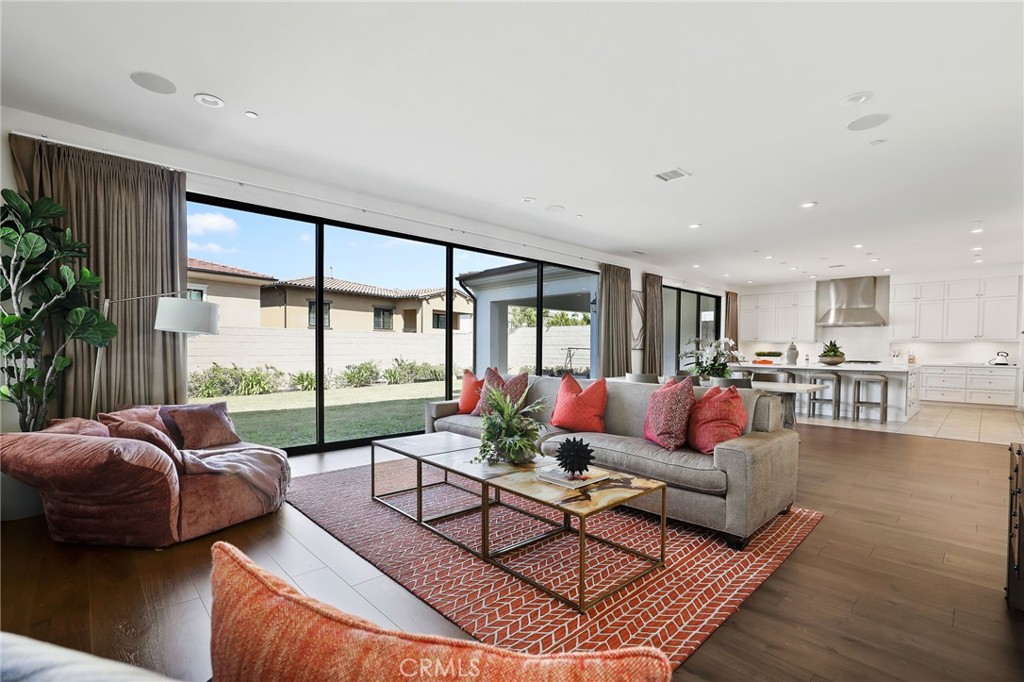 74 Egret Irvine, CA 92618 - Photo 10 of 74 a living room with furniture and a large window