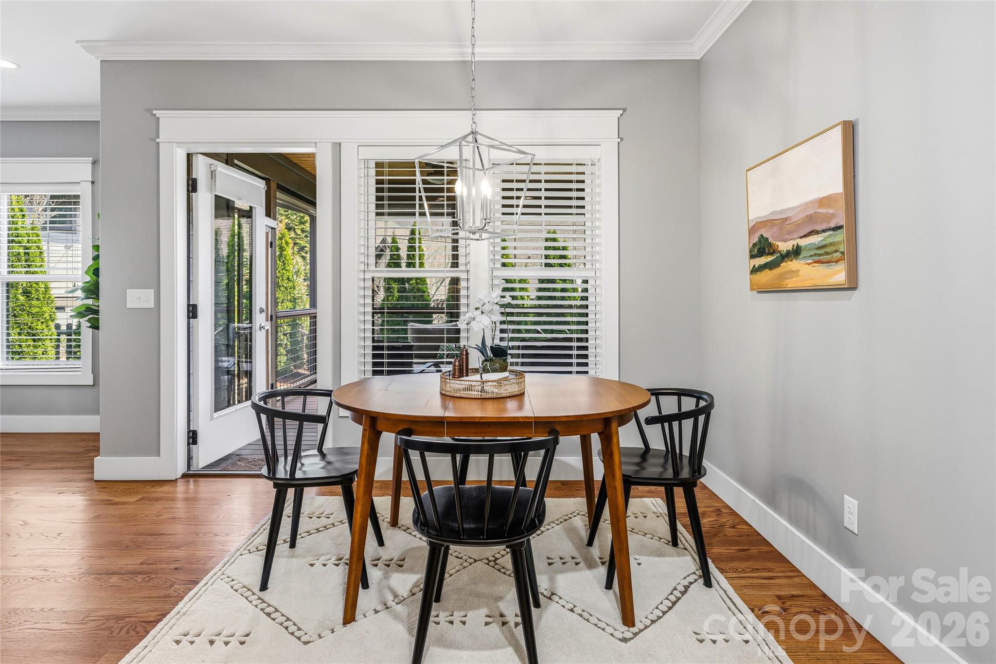 30 Still Creek Loop Fairview, NC 28730 - Photo 11 of 45 a view of a dining room with furniture window and wooden floor