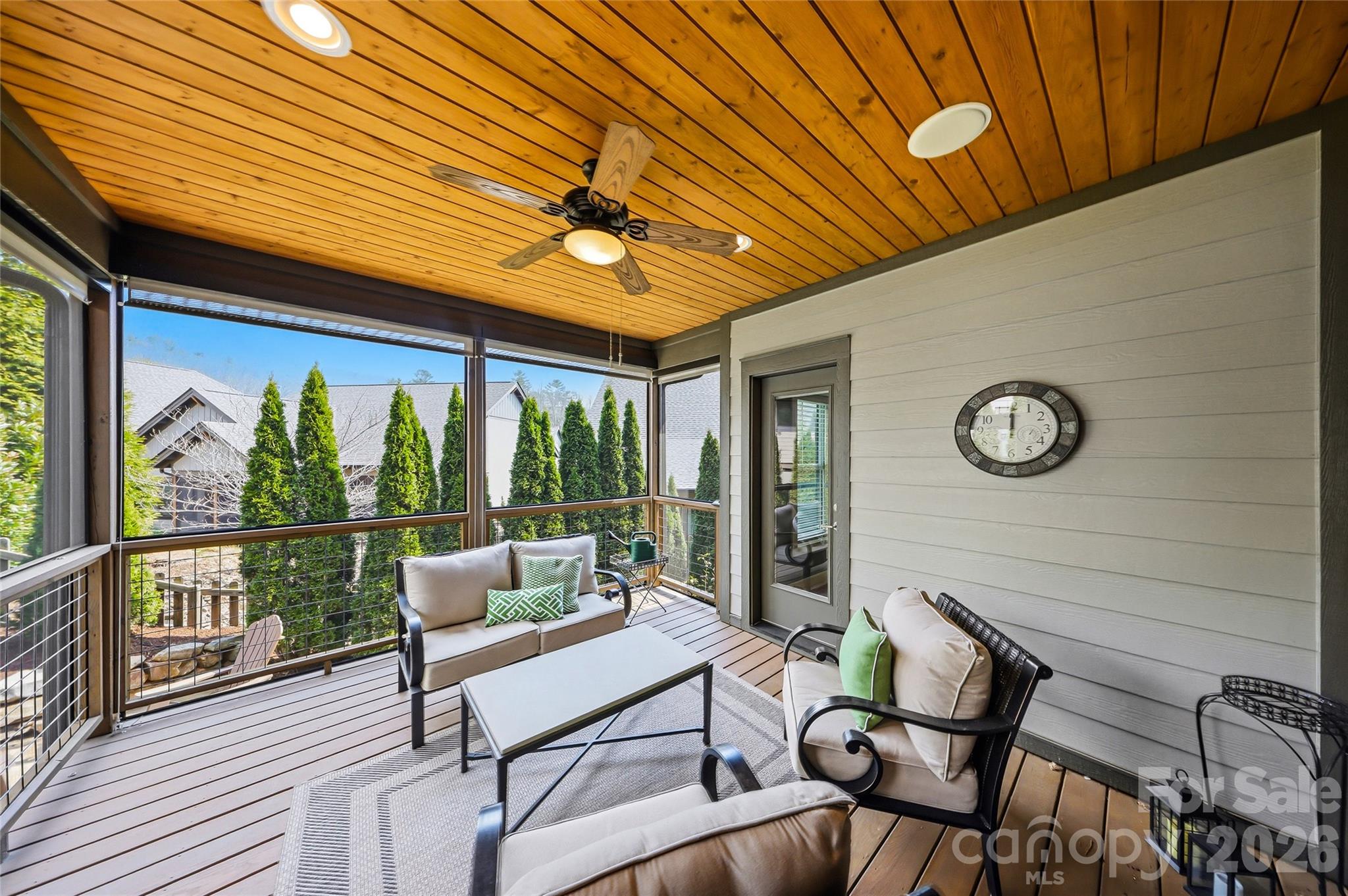 30 Still Creek Loop Fairview, NC 28730 - Photo 12 of 45 a balcony with furniture and wooden floor