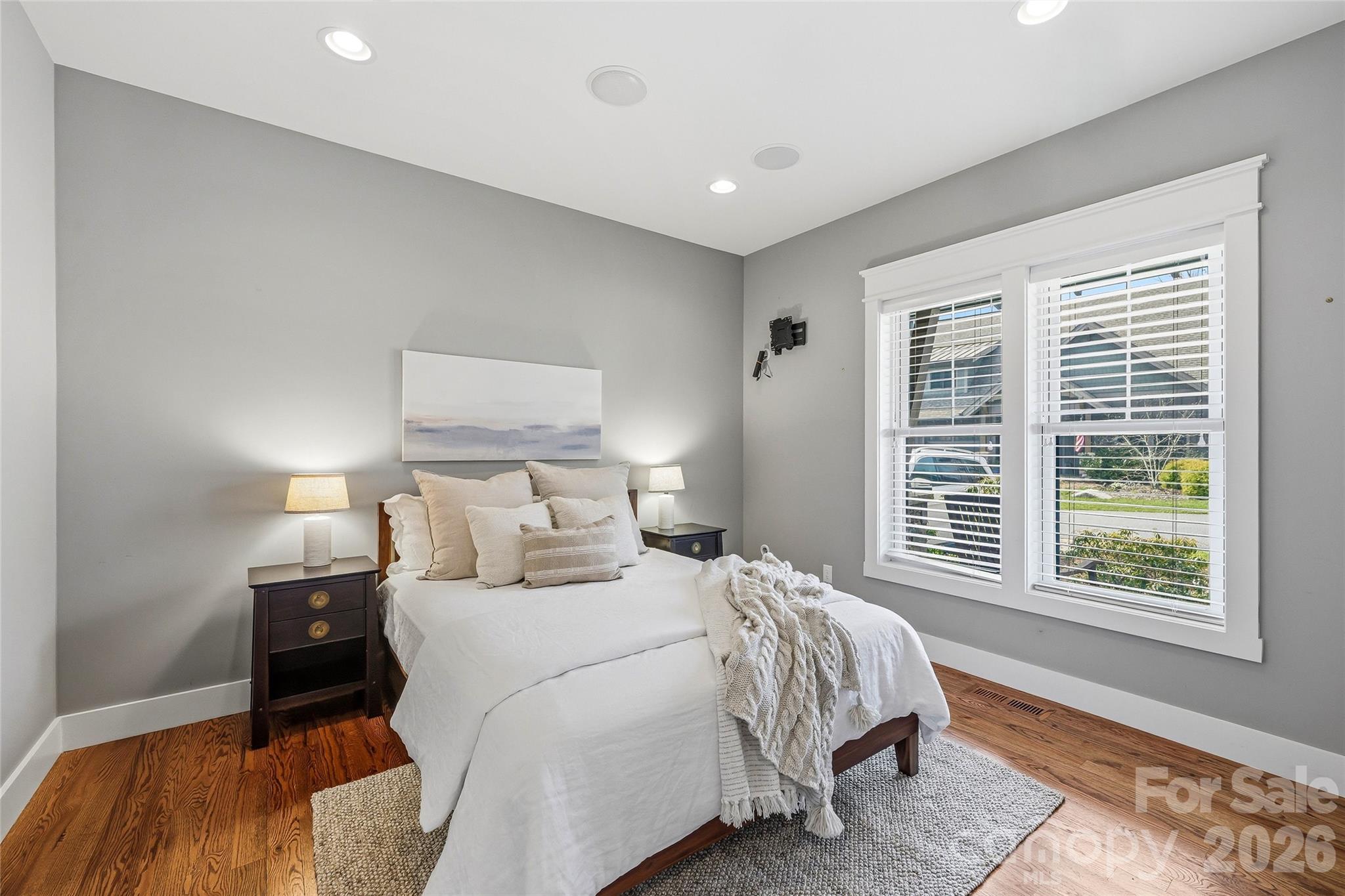 30 Still Creek Loop Fairview, NC 28730 - Photo 22 of 45 a bedroom with a bed and a window