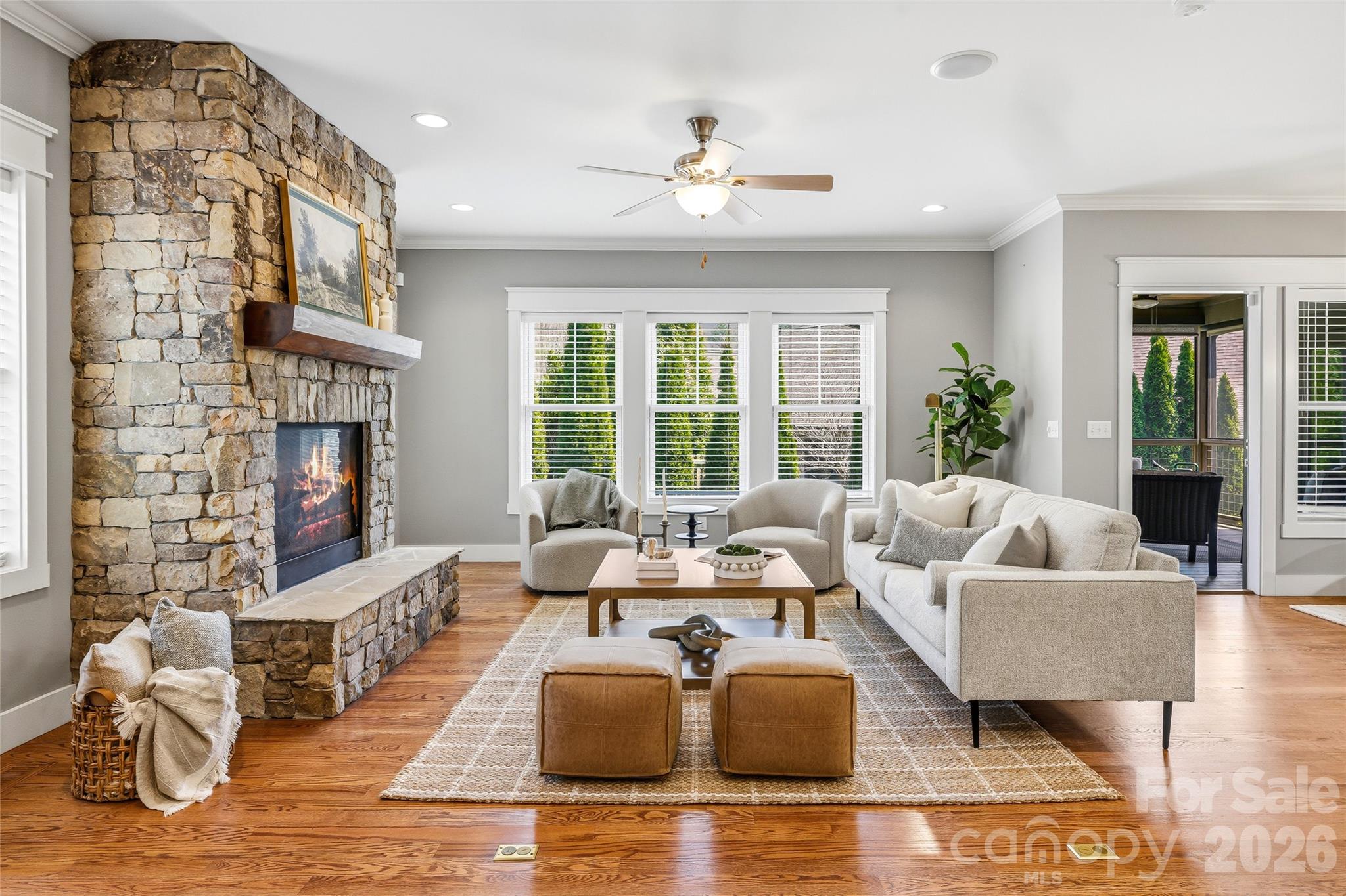30 Still Creek Loop Fairview, NC 28730 - Photo 3 of 45 a living room with fireplace furniture and a large window