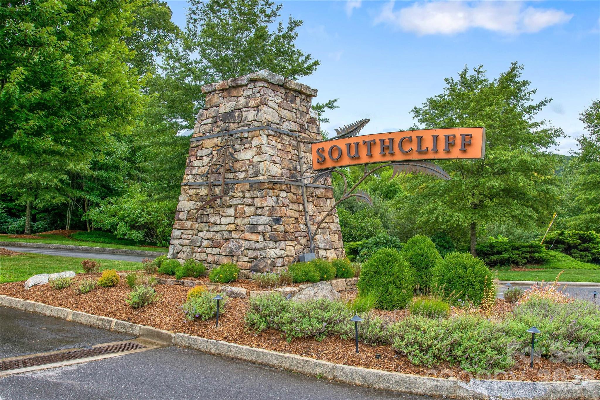 30 Still Creek Loop Fairview, NC 28730 - Photo 38 of 45 a sign on the side of a building