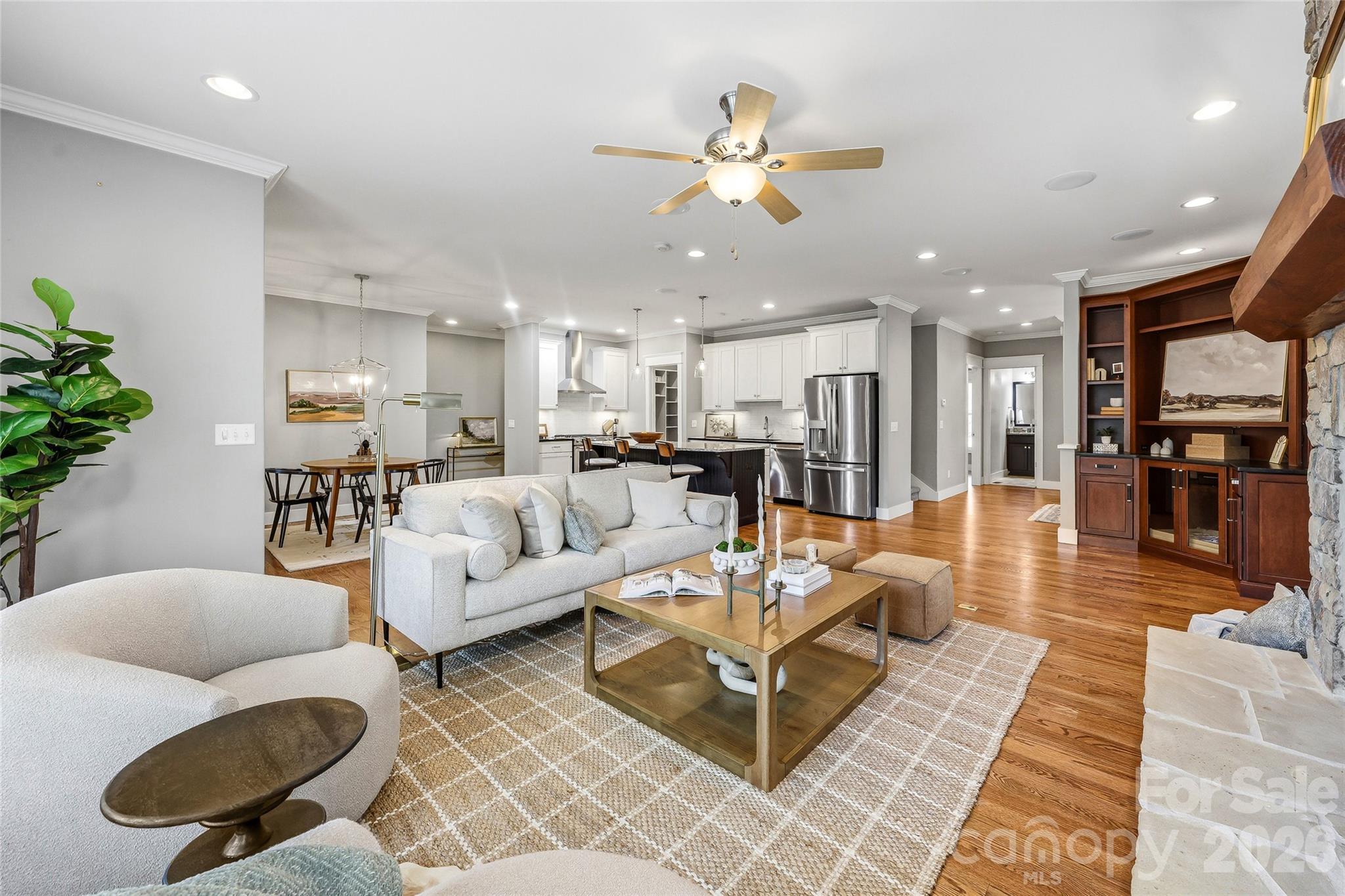 30 Still Creek Loop Fairview, NC 28730 - Photo 5 of 45 a living room with furniture kitchen view and a chandelier