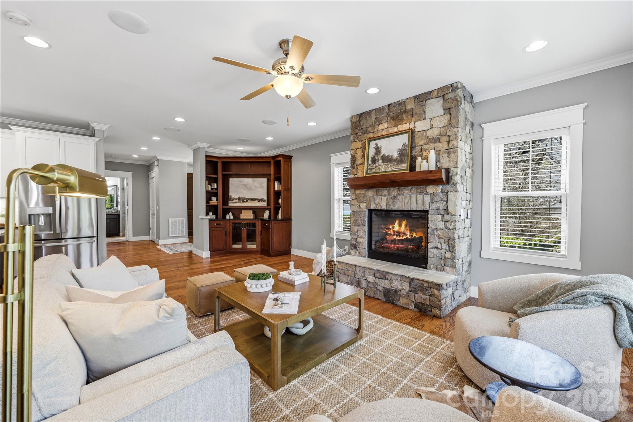 30 Still Creek Loop Fairview, NC 28730 - Photo 7 of 45 a living room with furniture a fireplace and a flat screen tv