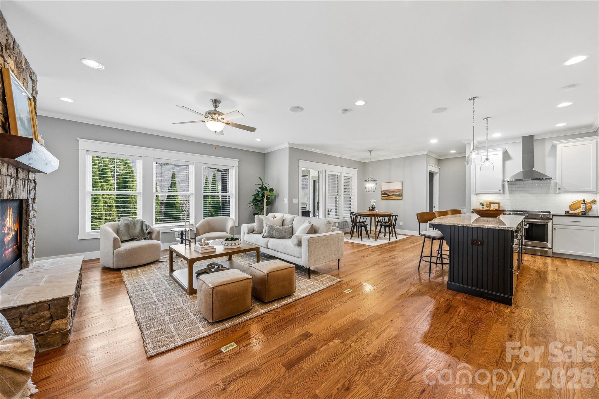 30 Still Creek Loop Fairview, NC 28730 - Photo 8 of 45 a living room with furniture fireplace and a large window
