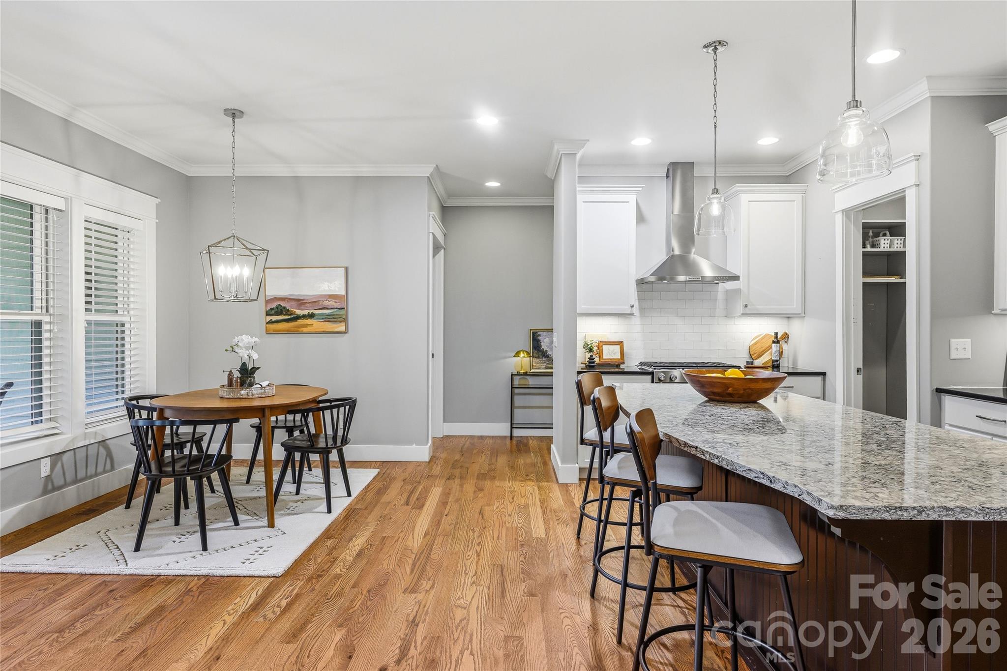 30 Still Creek Loop Fairview, NC 28730 - Photo 10 of 45 a dining room with furniture and wooden floor