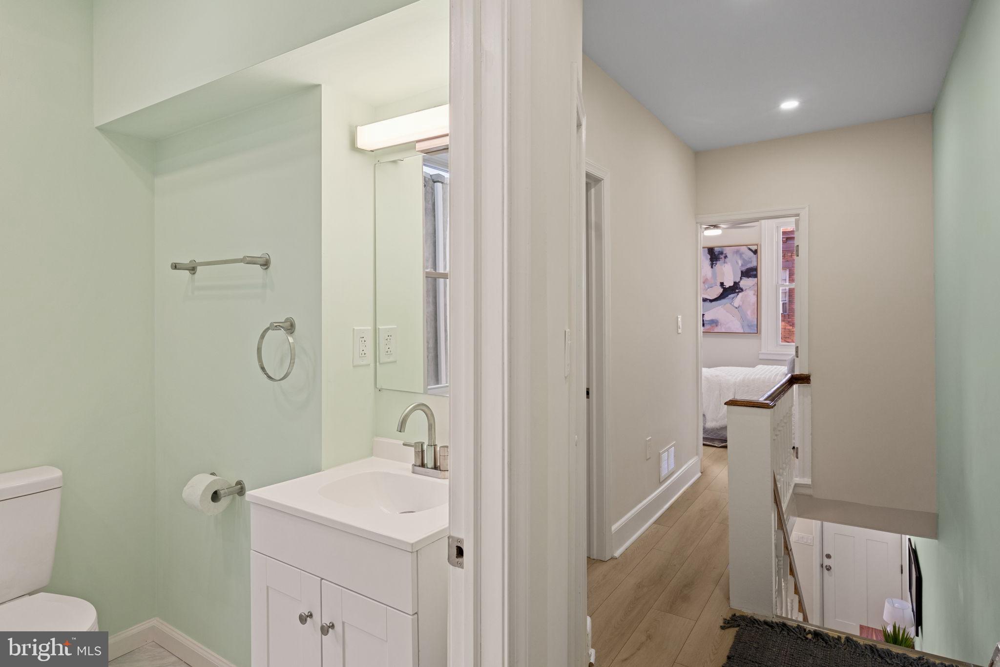 1937 South Lambert Street Philadelphia, PA 19145 - Photo 16 of 34 Modern bathroom with serene pastel hues.