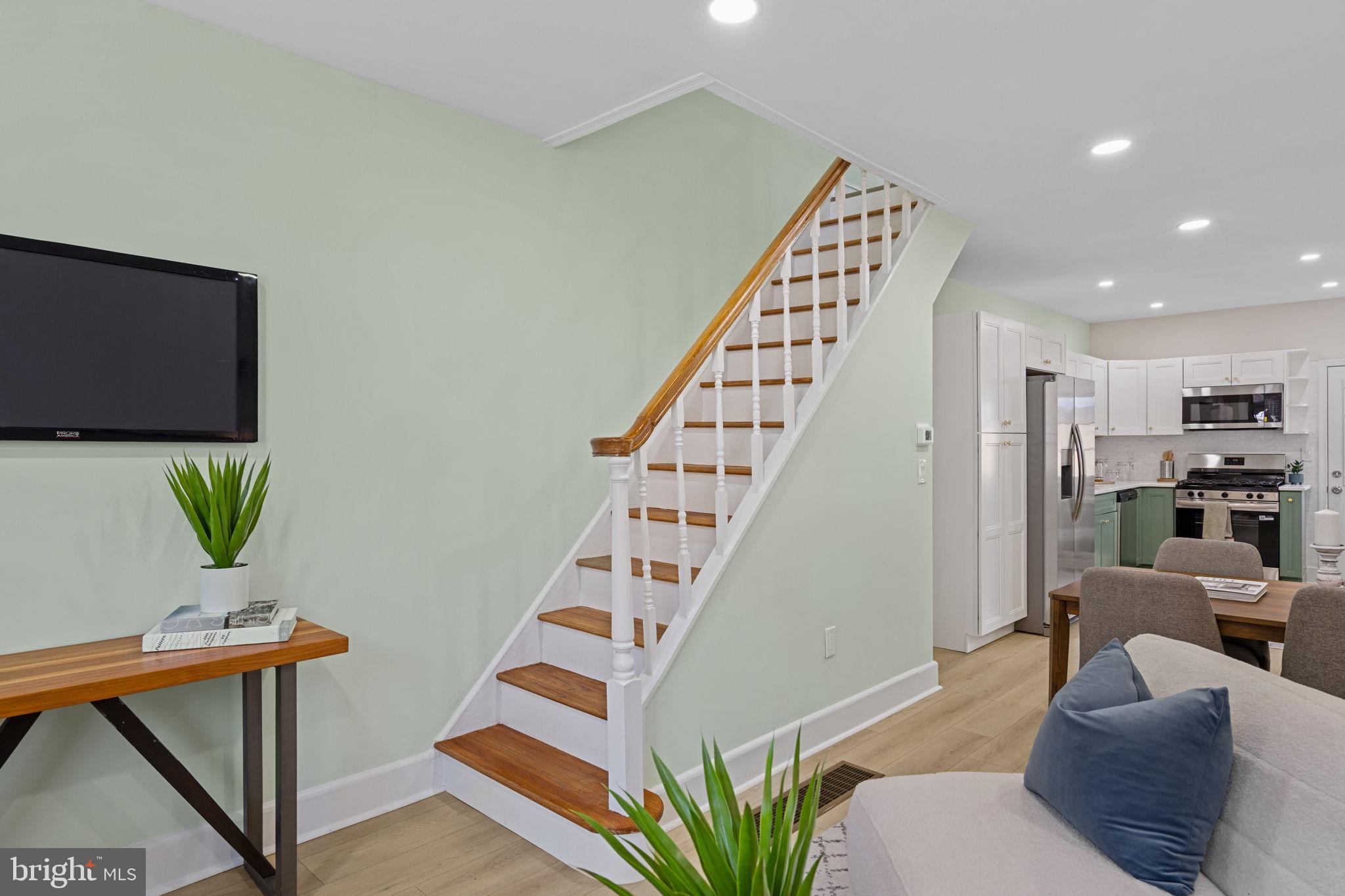1937 South Lambert Street Philadelphia, PA 19145 - Photo 2 of 34 Modern charm with inviting staircase allure.