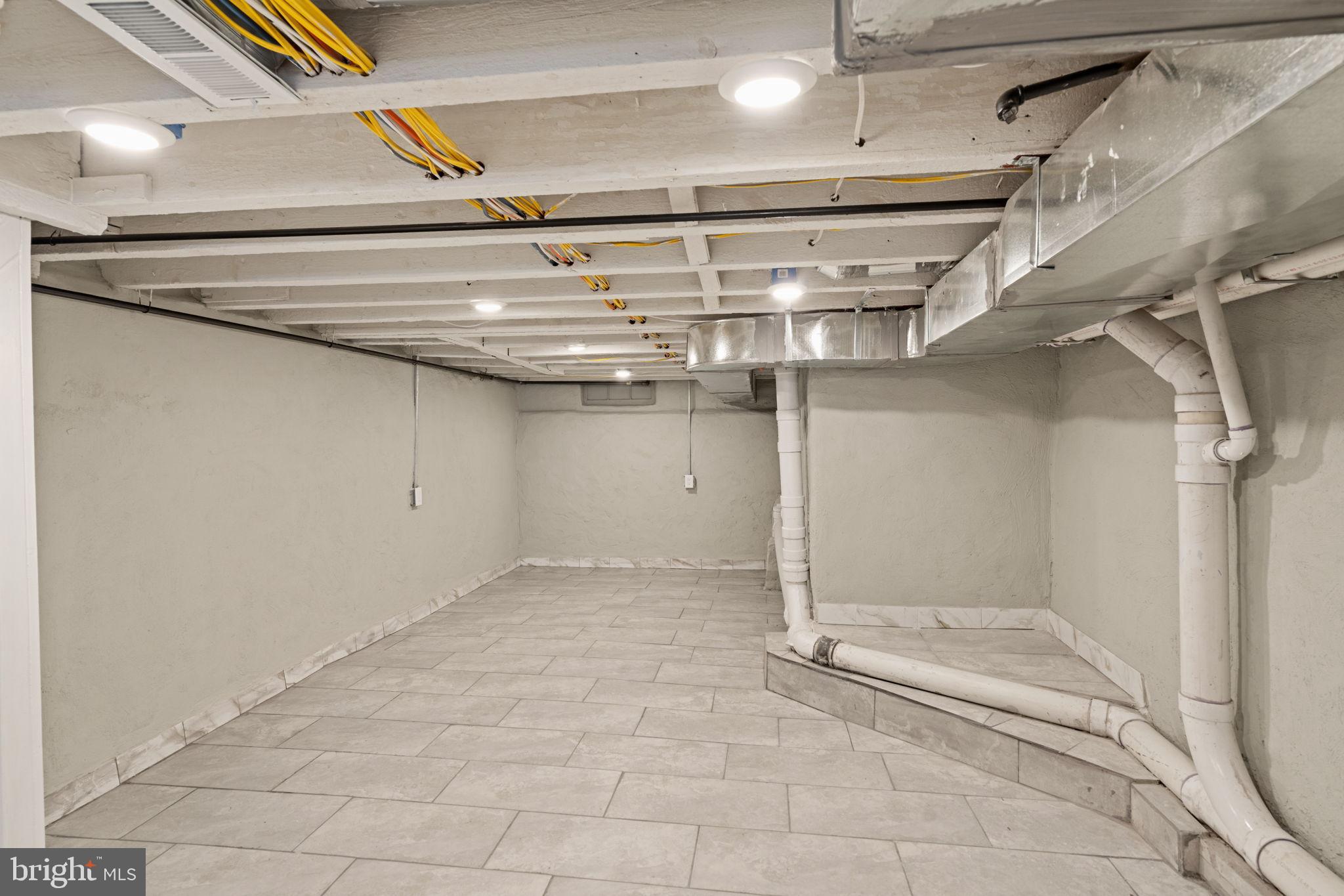 1937 South Lambert Street Philadelphia, PA 19145 - Photo 31 of 34 Spacious, versatile basement ready for ideas.