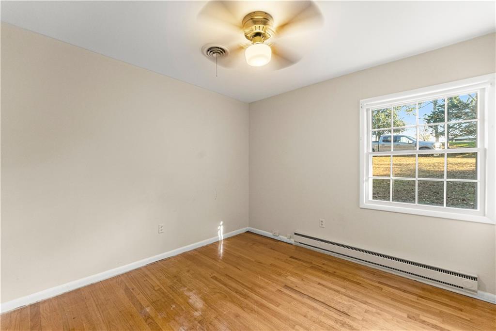 660 Honeysuckle Road Gainesville, GA 30501 - Photo 15 of 43 an empty room with a empty space and a window