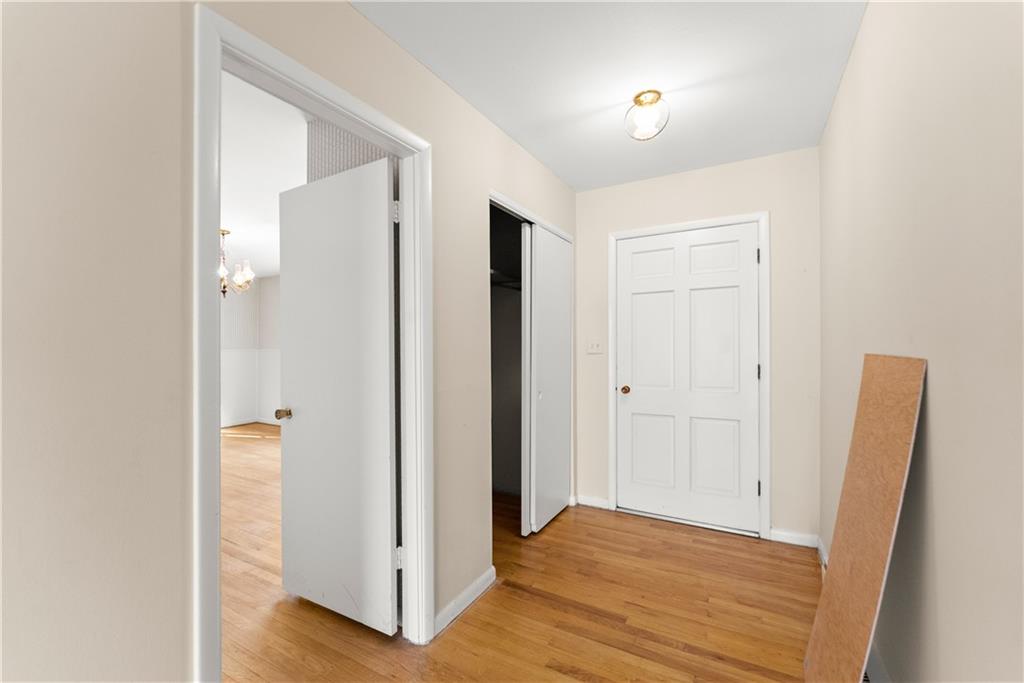 660 Honeysuckle Road Gainesville, GA 30501 - Photo 17 of 43 a view of hallway with wooden floor