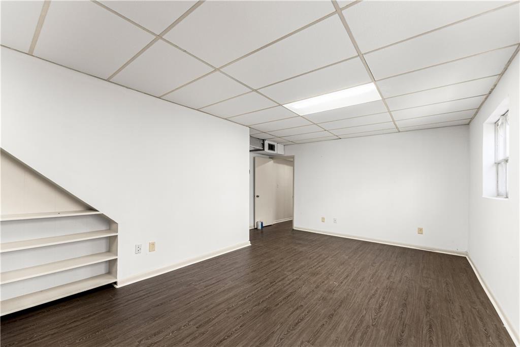 660 Honeysuckle Road Gainesville, GA 30501 - Photo 21 of 43 a view of a room with wooden floors and led lights