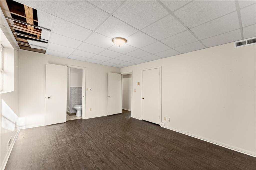 660 Honeysuckle Road Gainesville, GA 30501 - Photo 26 of 43 a view of wooden floor and windows in a room