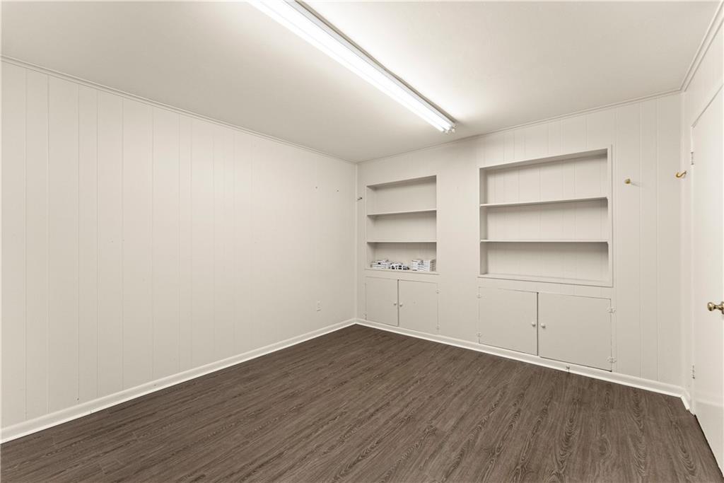 660 Honeysuckle Road Gainesville, GA 30501 - Photo 28 of 43 a view of a room with wooden floor and closet