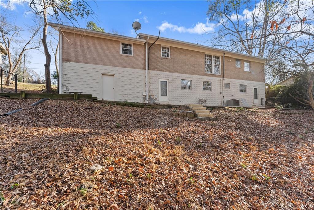 660 Honeysuckle Road Gainesville, GA 30501 - Photo 35 of 43 a front view of a house with a yard