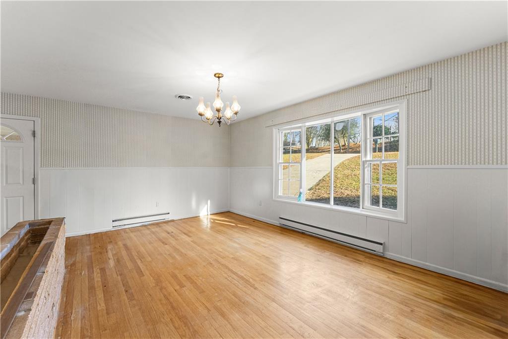 660 Honeysuckle Road Gainesville, GA 30501 - Photo 5 of 43 a view of an empty room with a window