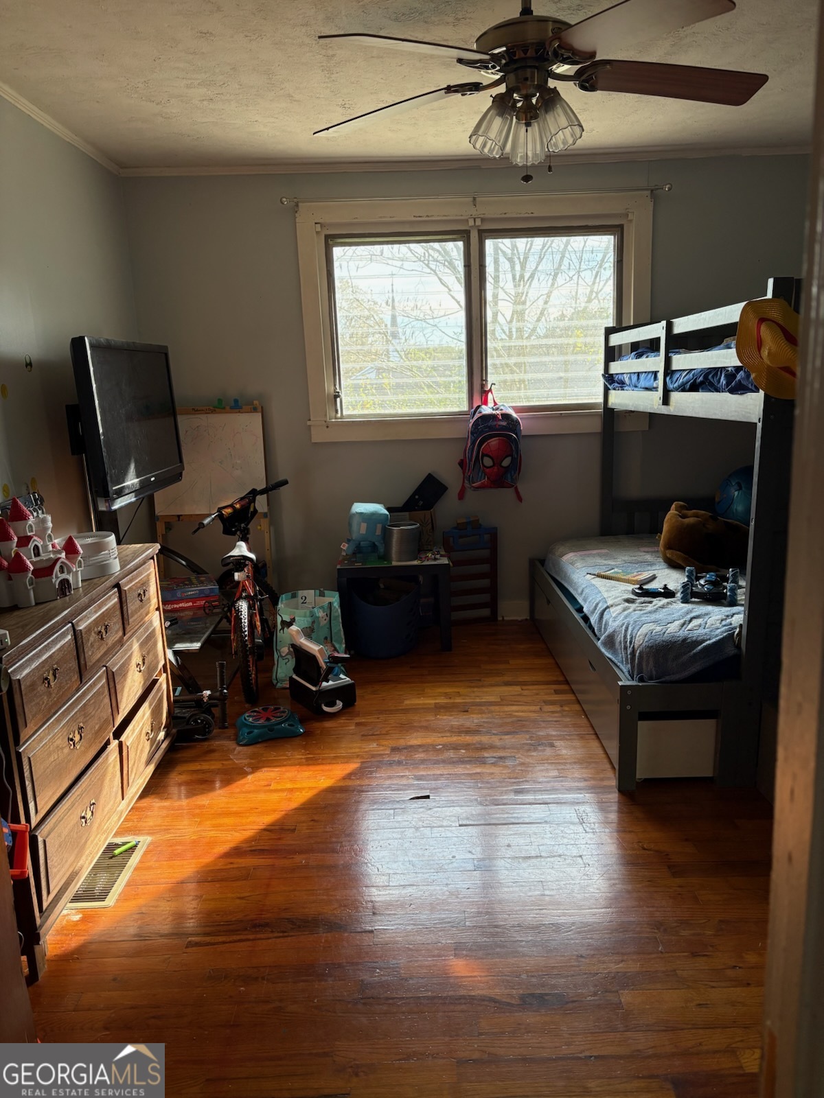 508 Pine Street West Point, GA 31833 - Photo 17 of 22 a living room with furniture and a large window