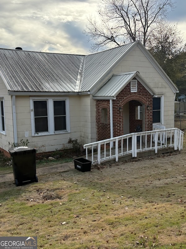 508 Pine Street West Point, GA 31833 - Photo 2 of 22 a front view of a house with windows