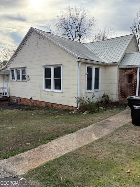 508 Pine Street West Point, GA 31833 - Photo 4 of 22 a front view of a house with a yard