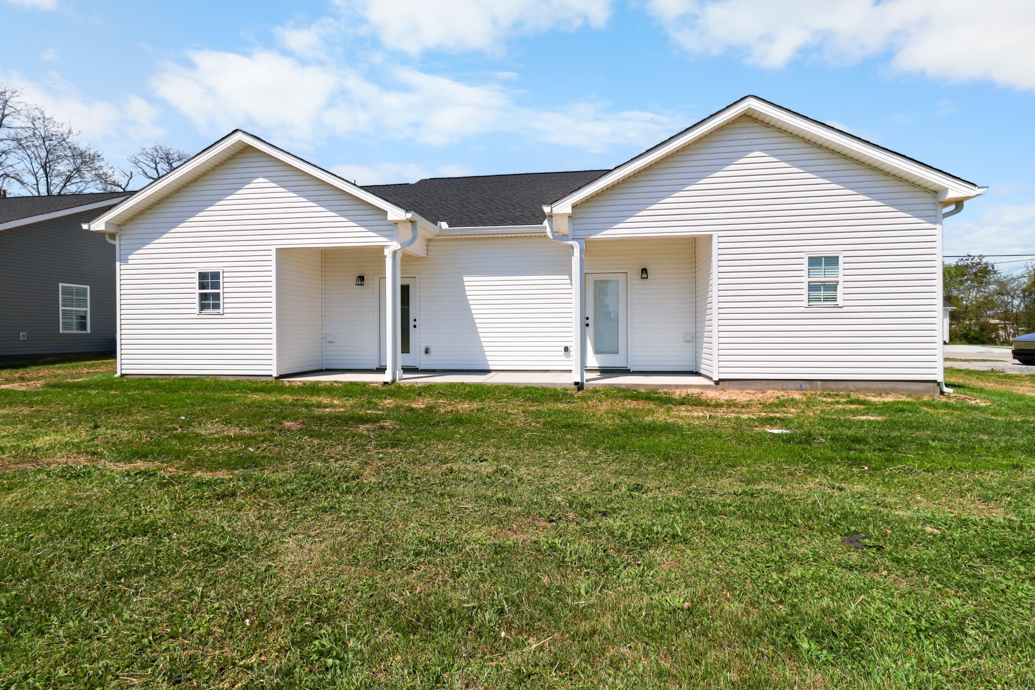 1004 Oak Street, Unit B Portland, TN 37148 - Photo 24 of 29 a front view of house with yard and green space