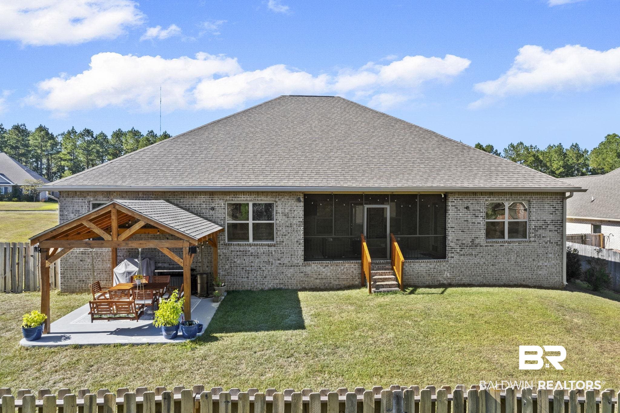 31500 Spoonbill Road Daphne, AL 36527 - Photo 53 of 85 Back of house with a patio and a yard