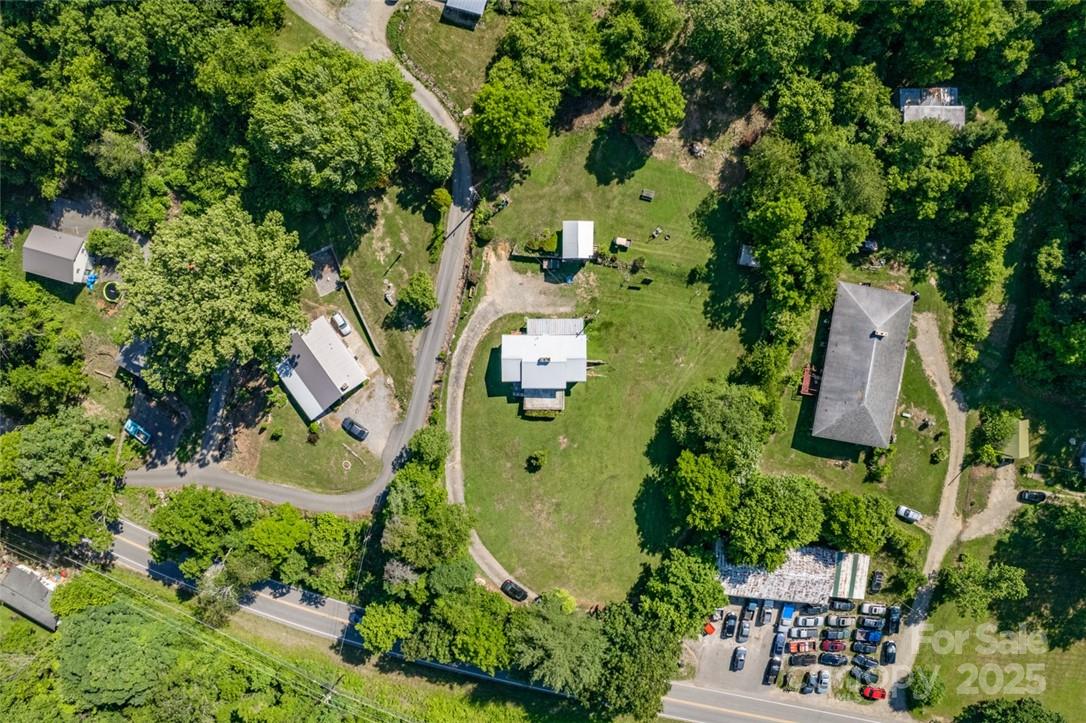 415 Weaverville Road Asheville, NC 28804 - Photo 30 of 47 an aerial view of a house with outdoor space