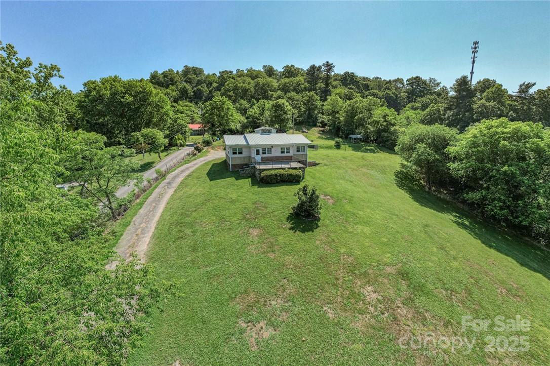 415 Weaverville Road Asheville, NC 28804 - Photo 34 of 47 a swimming pool with a yard