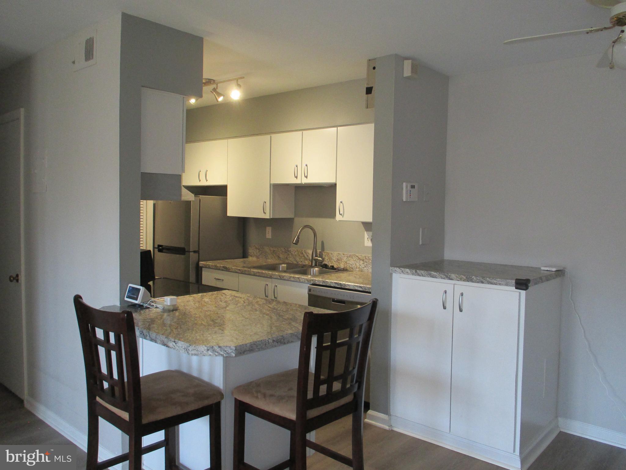 5903 L Kingsford Road, Unit 383 Springfield, VA 22152 - Photo 4 of 11 Island with seating