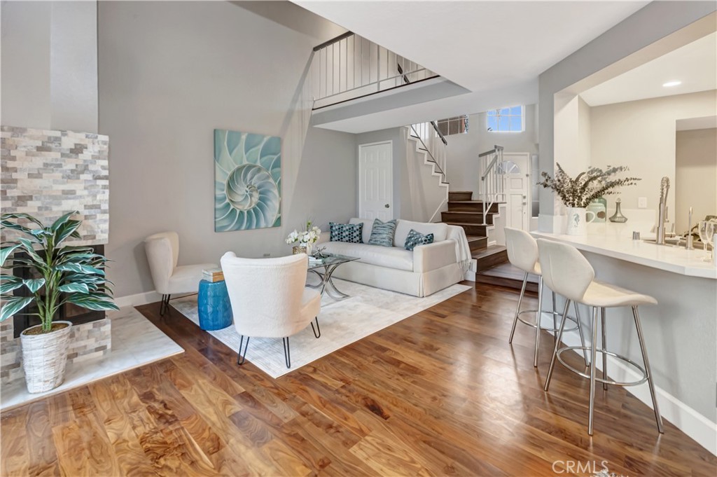 32395 Outrigger Way Laguna Niguel, CA 92677 - Photo 7 of 33 living room, open kitchen, open stairway