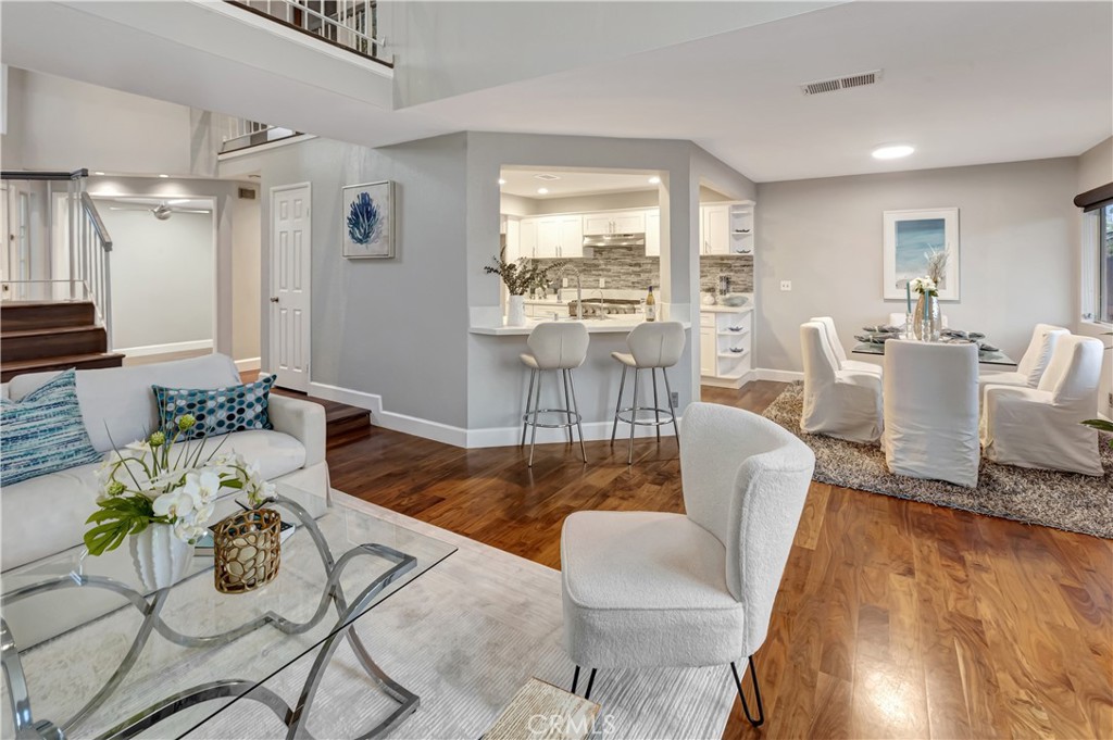 32395 Outrigger Way Laguna Niguel, CA 92677 - Photo 8 of 33 beautiful floors dining and open kitchen.