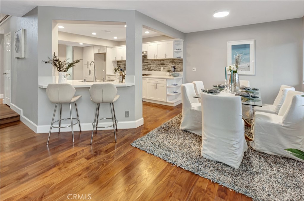 32395 Outrigger Way Laguna Niguel, CA 92677 - Photo 9 of 33 Breakfast bar, open kitchen and dining room