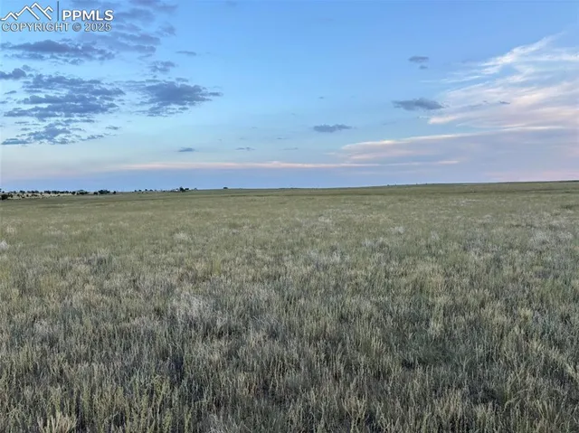 a view of an lake and sunset