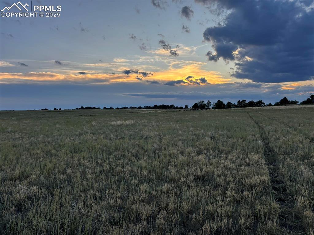 40655 Truckton Road Rush, CO 80833 - Photo 2 of 16 a view of an lake and sunset