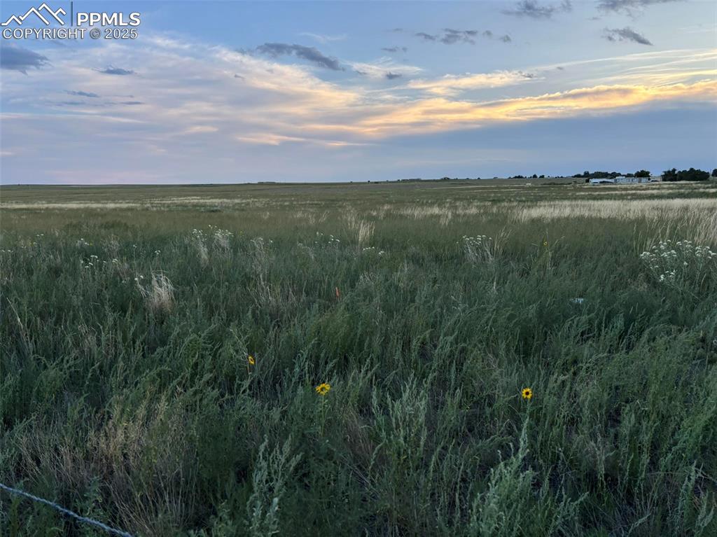 40655 Truckton Road Rush, CO 80833 - Photo 6 of 16 a view of an lake and sunset