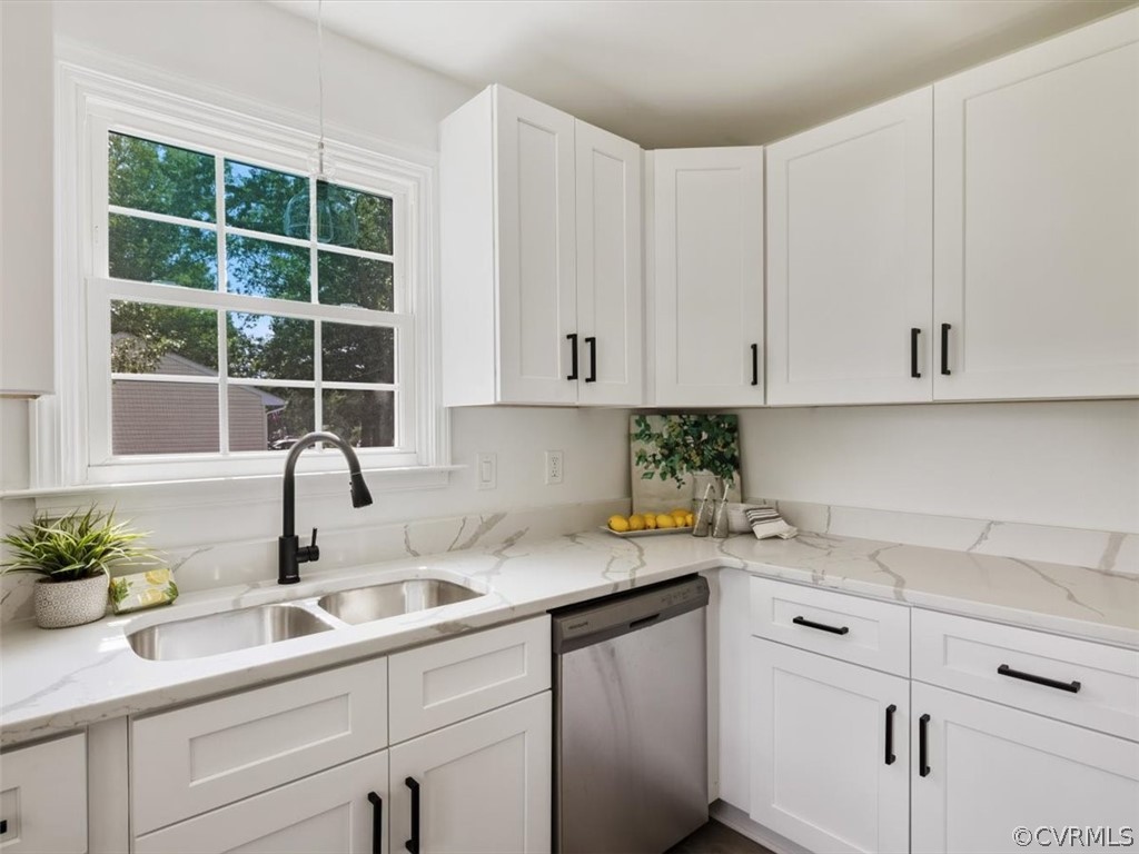 15531 Saddlebrook Road Chesterfield, VA 23838 - Photo 7 of 15 a kitchen with stainless steel appliances white cabinets sink and window