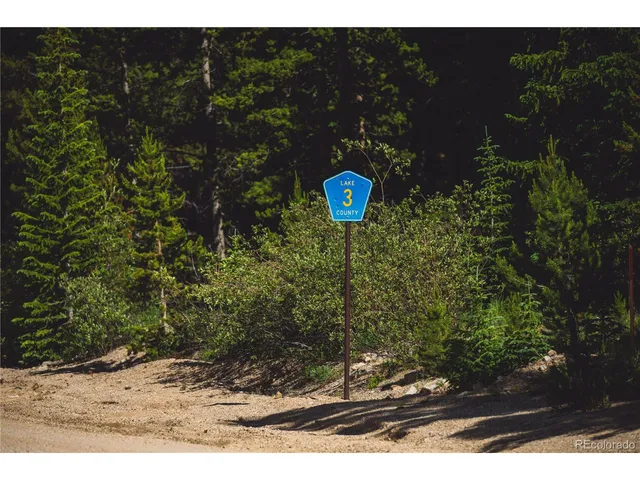 a view of a wooden door and sign board