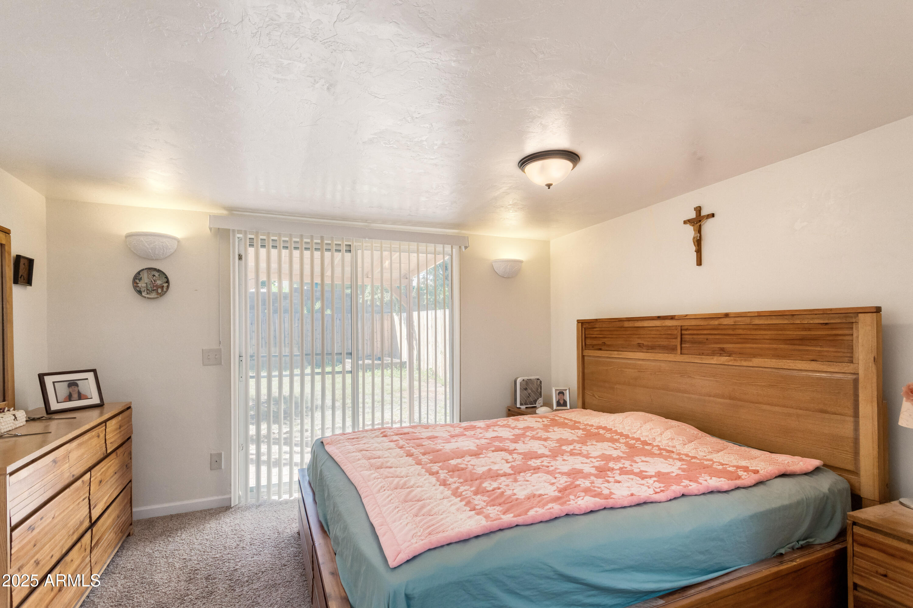 4964 East Raffaele Avenue Sierra Vista, AZ 85635 - Photo 19 of 41 a bedroom with a bed and a window