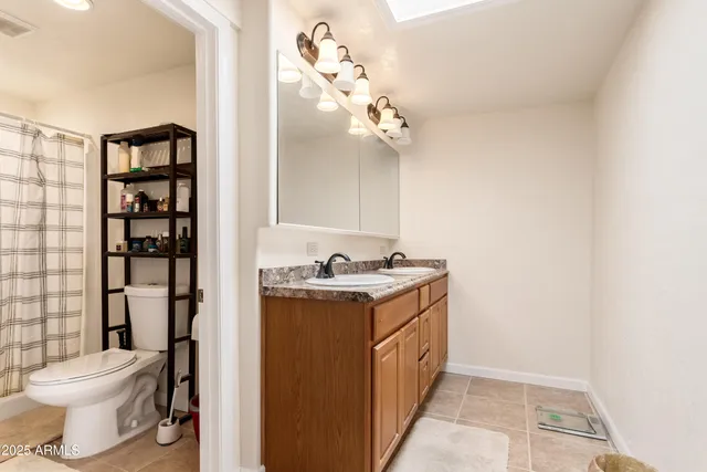 a view of a bathroom with a sink and a toilet