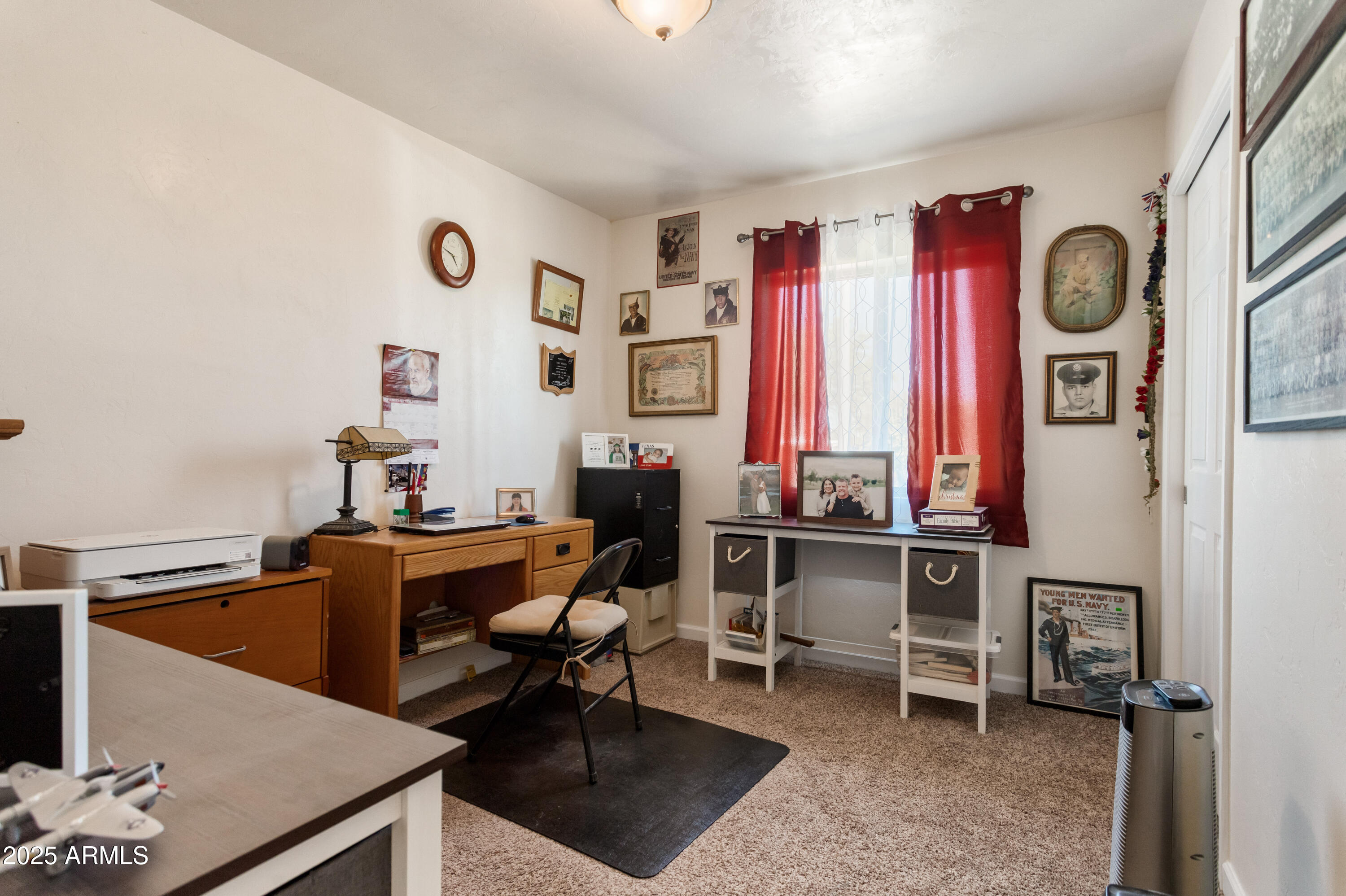 4964 East Raffaele Avenue Sierra Vista, AZ 85635 - Photo 28 of 41 a view of a workspace with furniture and a window